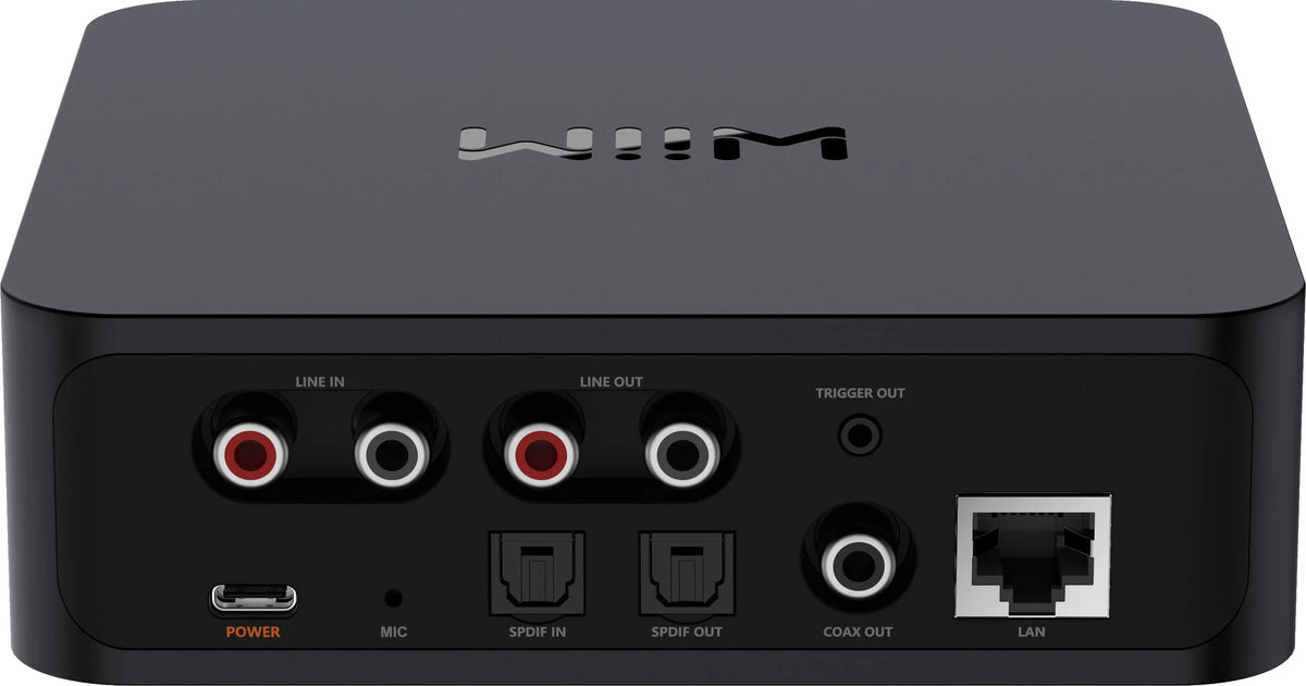 WiiM Pro Plus music streamer device with multiple ports and controls, designed for high-quality audio streaming.