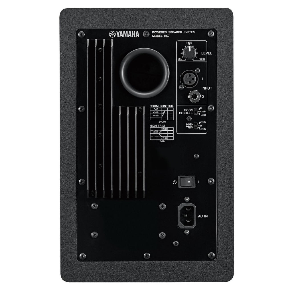 Yamaha HS7 active nearfield monitors with a sleek white-coned design and sturdy black cabinet setup in a studio environment.