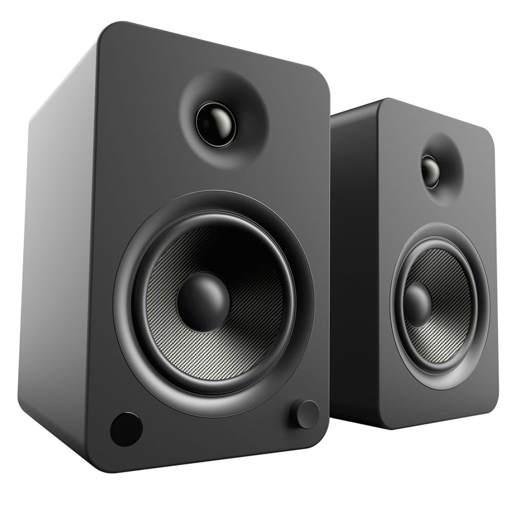 Kanto Audio YU4 wireless speakers with sleek black finish, featuring wood accents and compact design for versatile sound.