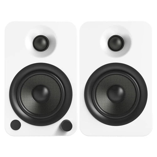 White Kanto Audio YU4 wireless speakers with sleek design and audio controls visible on the front.