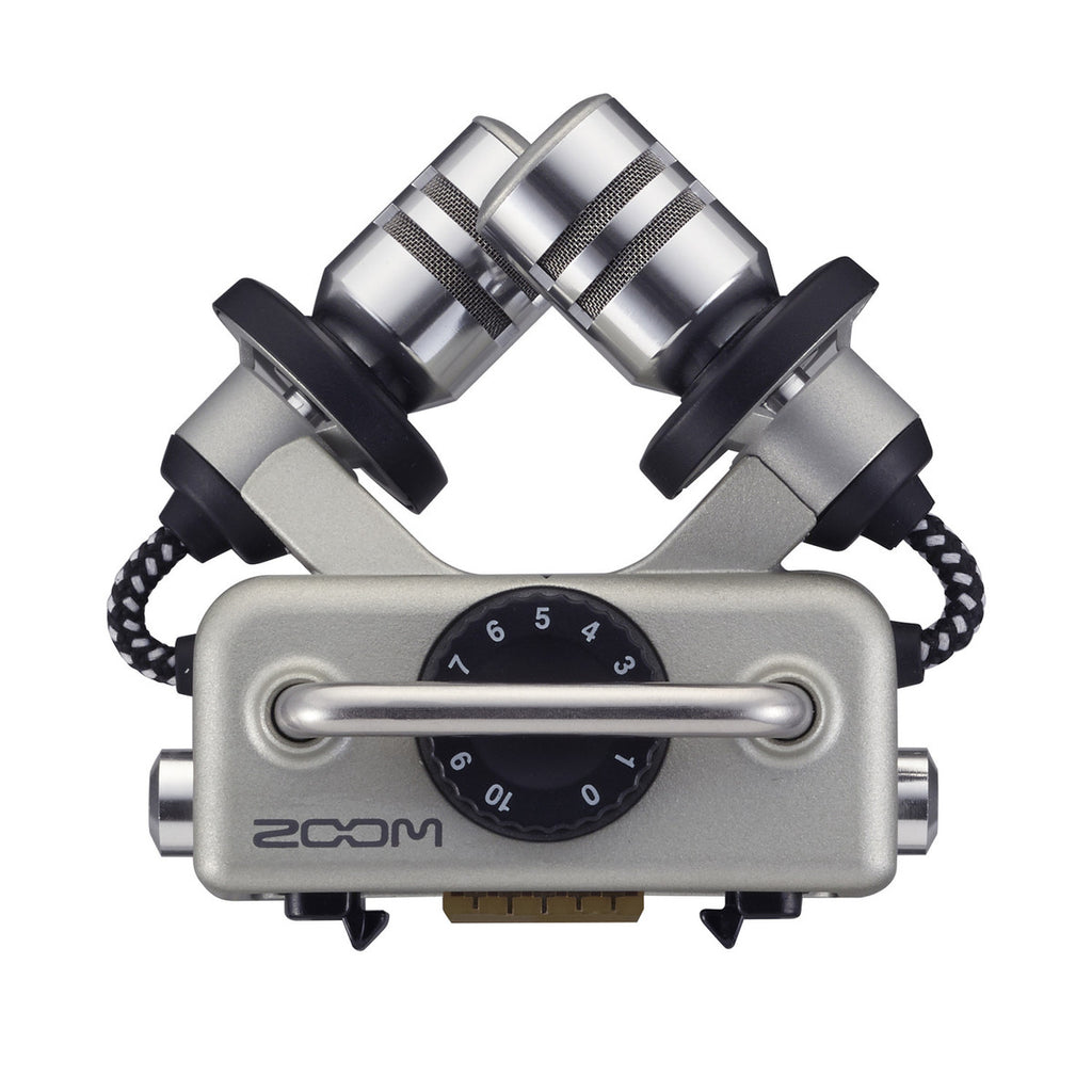 Zoom H5 digital recorder with handheld design, multiple input ports, and professional recording controls.