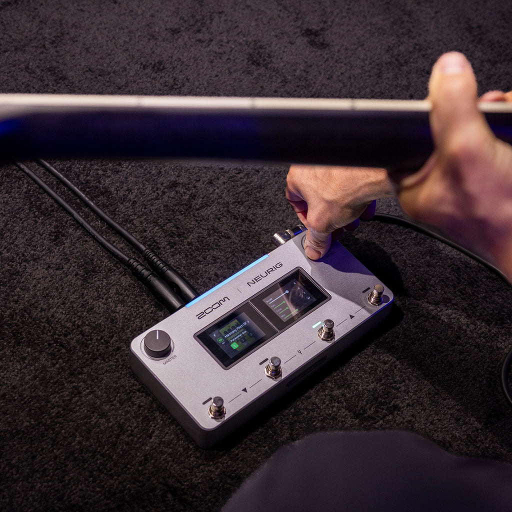 Zoom NEURIG footswitch in use while playing guitar
